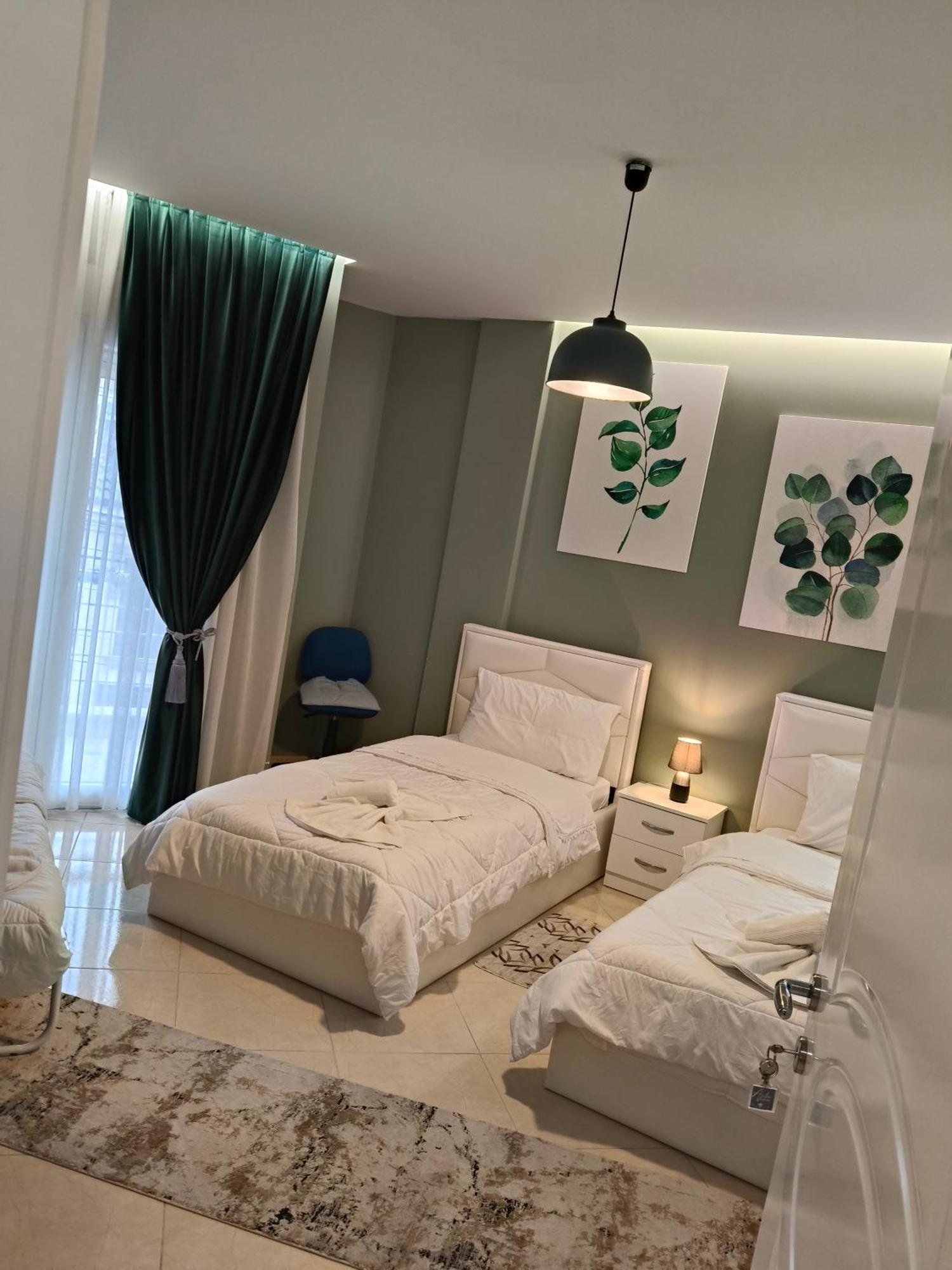 Ajilin Hotel Rooms Korce Rom bilde