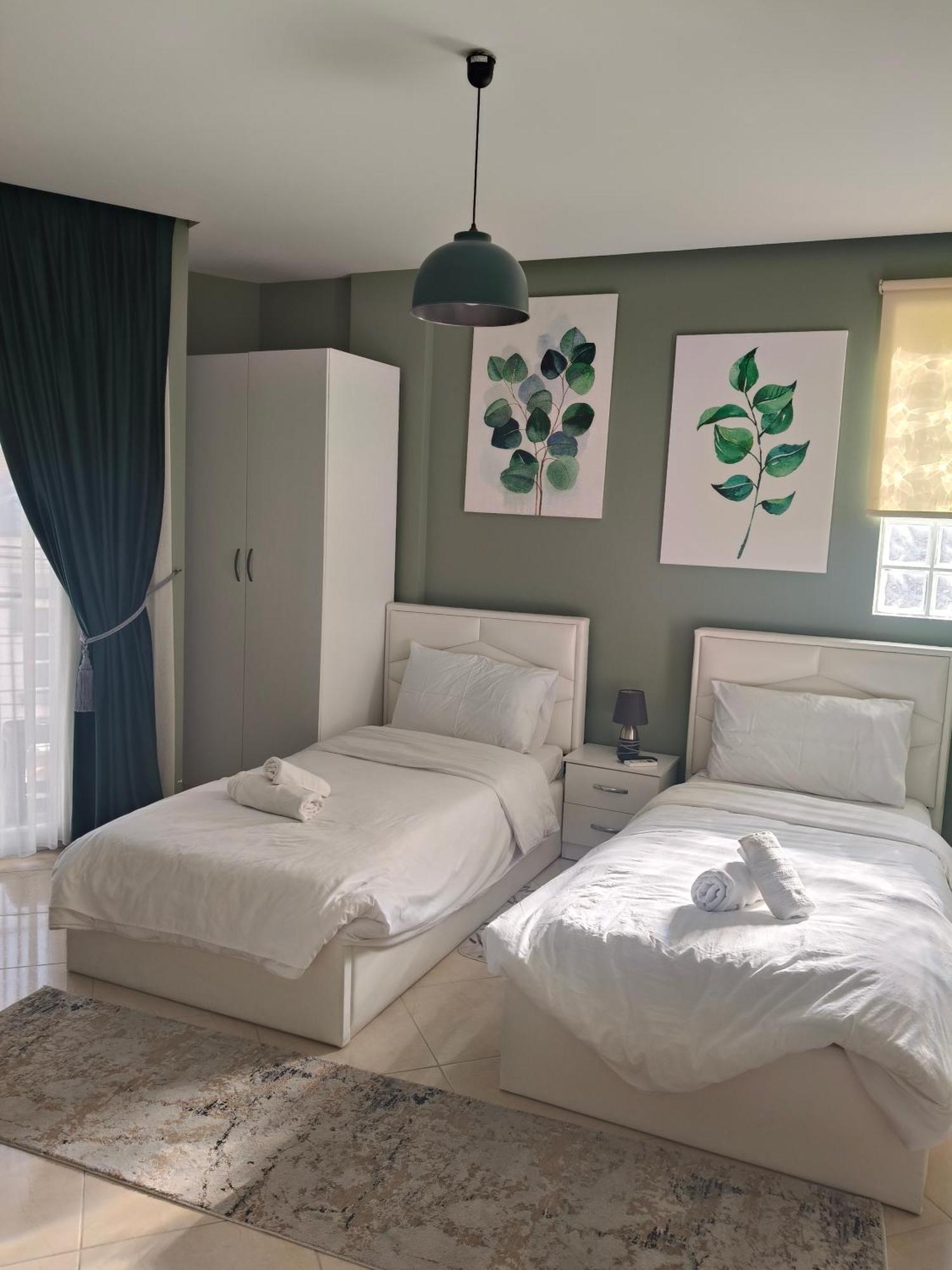 Ajilin Hotel Rooms Korce Rom bilde